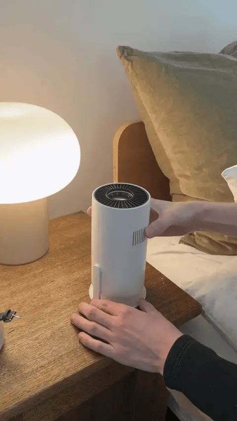 Hands tilting the Smart+ up on its stand